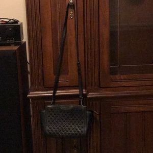 Michael Kords shoulder purse.